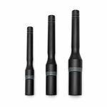 Three black car detailing brushes with protective caps fitted