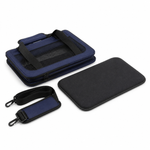 Blue pet travel carrier folded flat with removable cushion and shoulder strap